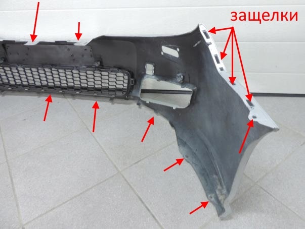 The attachment of the front bumper Renault Latitude