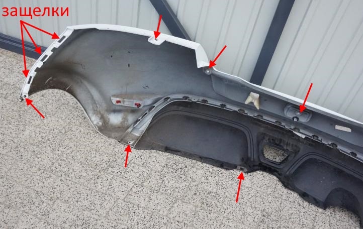 The attachment of the rear bumper Renault Wind